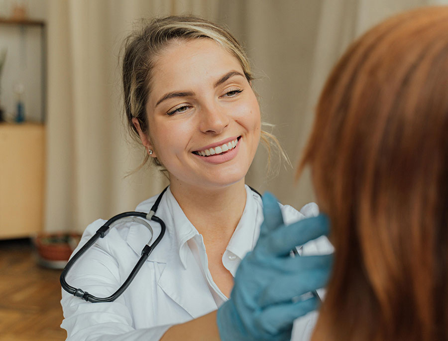 Nurse examining a patient